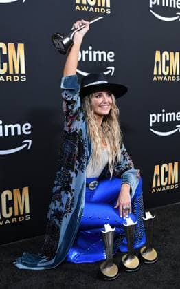 Lainey Wilson shows off her four awards, Female Artist of the Year, Album of the Year for Bell Bottom Country plus Visual Media of the Year and Music Event of the Year at the Academy of Country Music Awards at The Star in Frisco, TX on Thursday, May 11, 2023.  FRS2023051149 IANxHALPERIN
