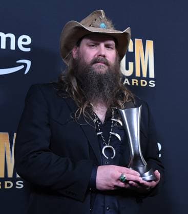 Chris Stapleton shows off his Entertainer of the Yerar award at the 2023 Academy of Country Music Awards at The Star in Frisco, TX on Thursday, May 11, 2023.  FRS2023051157 IANxHALPERIN