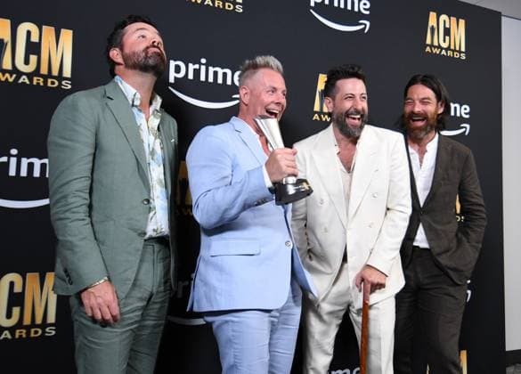 Old Dominion shows off their Group of the Year Award at the 2023 Academy of Country Music Awards at The Star in Frisco, TX on Thursday, May 11, 2023.  FRS2023051158 IANxHALPERIN