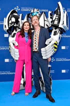 Katrin Bauerfeind and Uke Bosse with Gamescom Bot at the award ceremony of the German Computer Game Award 2023 at Spindler Klatt Berlin, 11 05 2023 Foto:xN.xKubelkax xFuturexImage