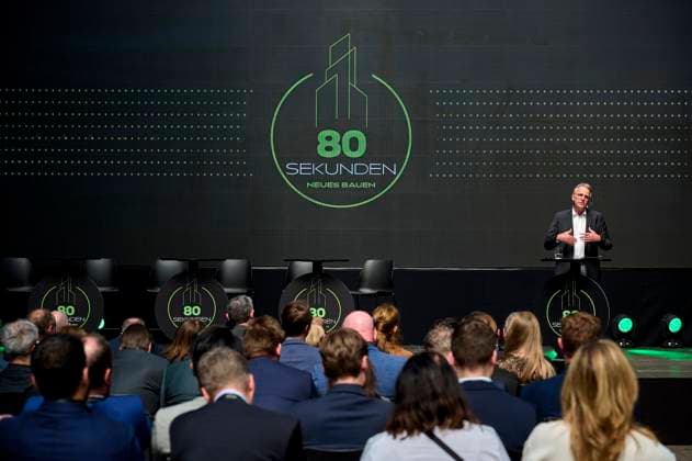 80 Seconds New Building Keynote Stefan Wenzel, BMWK EUR, Europe, Germany, Berlin, 12 05 2023 Under the motto Every 80 seconds a dwelling would have to be built to reach the goal of 400,000 new dwellings per year The construction site talk 80 Seconds New Building mediates contacts between politics, business, investors as well as the scientific community