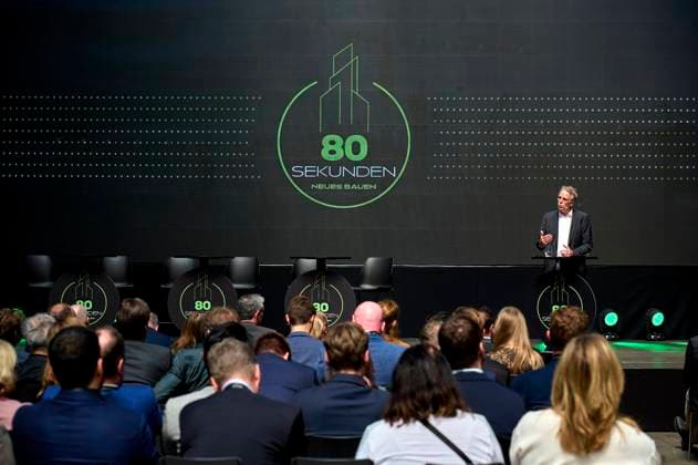 80 Seconds New Building Keynote Stefan Wenzel, BMWK EUR, Europe, Germany, Berlin, 12 05 2023 Under the motto Every 80 seconds a dwelling would have to be built to reach the goal of 400,000 new dwellings per year The construction site talk 80 Seconds New Building mediates contacts between politics, business, investors as well as the scientific community