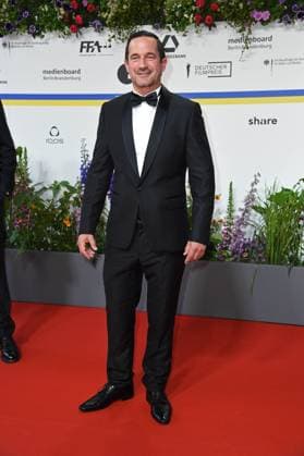 Sönke Möhring arriving on the red carpet for the GERMAN FILM AWARD 2023 at the Theater am Potsdamer Platz in Berlin on 12 05 2023
