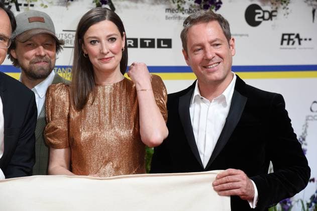Alexandra Maria Lara, Florian Gallenberger arriving on the red carpet for the GERMAN FILM AWARD 2023 at the Theater am Potsdamer Platz in Berlin on 12 05 2023