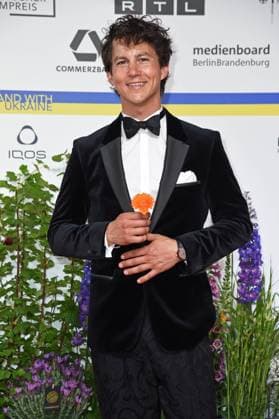 Tim Oliver Schultz arriving on the red carpet for the GERMAN FILM AWARD 2023 at the Theater am Potsdamer Platz in Berlin on 12 05 2023