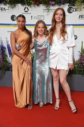 Taneshia Abt, Paula Kalenberg, Pheline Roggan arriving on the red carpet for the GERMAN FILM AWARD 2023 at the Theater am Potsdamer Platz in Berlin on 12 05 2023