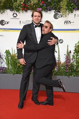Pierre Kiwitt, Thomas Arnold arriving on the red carpet for the GERMAN FILM AWARD 2023 at the Theater am Potsdamer Platz in Berlin on 12 05 2023