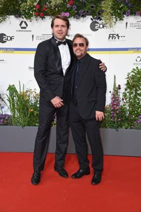 Pierre Kiwitt, Thomas Arnold arriving on the red carpet for the GERMAN FILM AWARD 2023 at the Theater am Potsdamer Platz in Berlin on 12 05 2023