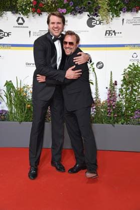 Pierre Kiwitt, Thomas Arnold arriving on the red carpet for the GERMAN FILM AWARD 2023 at the Theater am Potsdamer Platz in Berlin on 12 05 2023