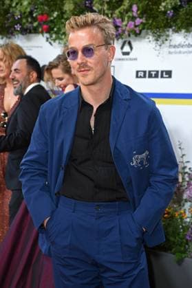 Albrecht Schuch arriving on the red carpet for the GERMAN FILM AWARD 2023 at the Theater am Potsdamer Platz in Berlin on 12 05 2023