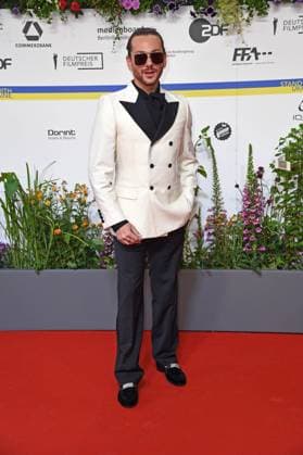 Riccardo Simonetti arriving on the red carpet for the GERMAN FILM AWARD 2023 at the Theater am Potsdamer Platz in Berlin on 12 05 2023
