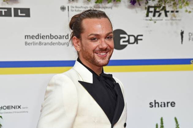 Riccardo Simonetti arriving on the red carpet for the GERMAN FILM AWARD 2023 at the Theater am Potsdamer Platz in Berlin on 12 05 2023