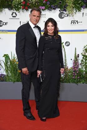Iris Berben with boyfriend Heiko Kiesow arriving on the red carpet for the GERMAN FILM AWARD 2023 at the Theater am Potsdamer Platz in Berlin on 12 05 2023