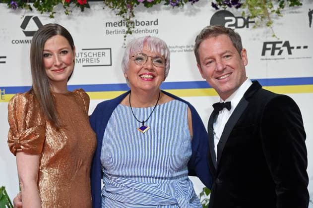 Alexandra Maria Lara, Claudia Roth, Florian Gallenberger arriving on the red carpet for the GERMAN FILM AWARD 2023 at the Theater am Potsdamer Platz in Berlin on 12 05 2023