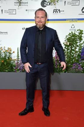 Axel Stein arriving on the red carpet for the GERMAN FILM AWARD 2023 at the Theater am Potsdamer Platz in Berlin on 12 05 2023