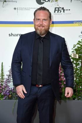 Axel Stein arriving on the red carpet for the GERMAN FILM AWARD 2023 at the Theater am Potsdamer Platz in Berlin on 12 05 2023