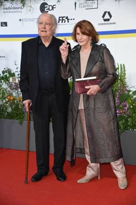 Senta Berger with husband Michael Verhoeven arriving on the red carpet for the GERMAN FILM AWARD 2023 at the Theater am Potsdamer Platz in Berlin on 12 05 2023
