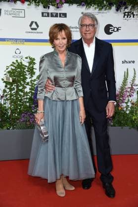 Ulrike Kriener with husband Georg Weber arriving on the red carpet for the DEUTSCHER FILMPREIS 2023 at the Theater am Potsdamer Platz in Berlin on 12 05 2023