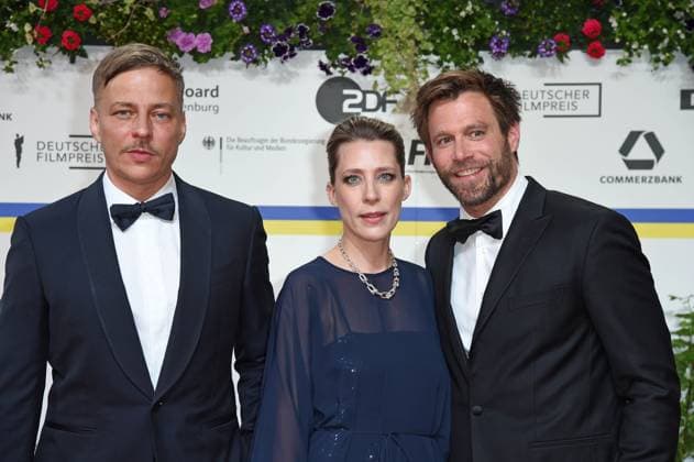 Tom Wlaschiha, Ken Duken with wife Marisa Leonie Bach arriving on the red carpet for the GERMAN FILM AWARD 2023 at the Theater am Potsdamer Platz in Berlin on 12 05 2023