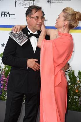 Anna Loos with husband Jan Josef Liefers arriving on the red carpet for the GERMAN FILM AWARD 2023 at the Theater am Potsdamer Platz in Berlin on 12 05 2023
