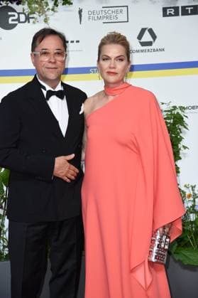 Anna Loos with husband Jan Josef Liefers arriving on the red carpet for the GERMAN FILM AWARD 2023 at the Theater am Potsdamer Platz in Berlin on 12 05 2023
