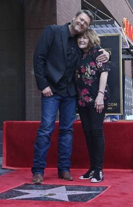 Singer and entertainer Blake Shelton is joined by his mother Dorothy Shackleford during an unveiling ceremony honoring him with the 2,755th star on the Hollywood Walk of Fame on Friday, May 12, 2023.  LAP2023051217 JIMxRUYMEN