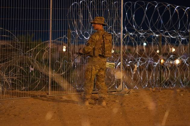 May 11, 2023, El Paso, TX, United States: Texas Army National Guard soldiers with the governors self-styled Texas Tactical Border Force, on overnight security detail during Operation Lone Star Task Force West, May 11, 2023 near El Paso, Texas. The fear over a migrant surge after Title 42 expired failed to materialize with fewer migrants risking the tougher penalties under the new Title 8 rules. El Paso United States - ZUMAp138 20230511_zaa_p138_019 Copyright: xMarkxOtte TexasxNationalx