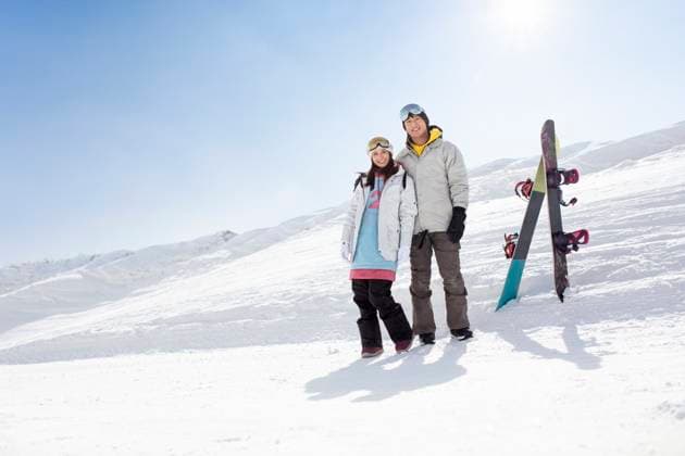 Happy young couple skiing in ski resort Beijing China Copyright: xLianxFeix bji05740118
