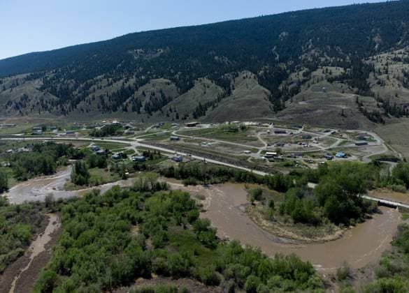 May 14, 2023, CACHE CREEK, BC, CANADA: The swollen Bonaparte River runs through the Bonaparte First Nation north of Cache Creek, B.C., on Sunday, May 14, 2023. Environment Canada says unseasonably hot temperatures in British Columbia will persist over the coming days, with special weather statements warning of high river streamflows due to melting snow in hard-hit communities in the province s interior. CACHE CREEK CANADA  - ZUMAc35_ 20230514_zaf_c35_111 Copyright: xDarrylxDyckx