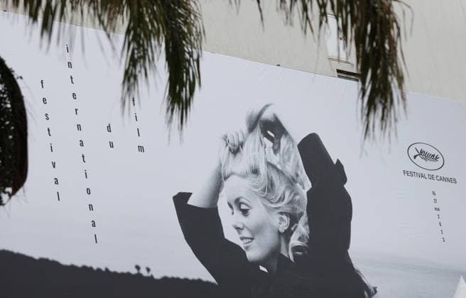 (230516) -- CANNES, May 16, 2023 -- A huge poster of the 76th edition of the Cannes Film Festival is seen outside the Palais du Festival in Cannes, southern France, May 15, 2023. The film festival will be held from May 16 to 27, 2023. ) FRANCE-CANNES-FILM FESTIVAL-PREPARATION GaoxJing 