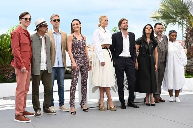 American actor Paul Dano, French actor Denis Menochet, Argentinian director Damian Szifron, Zambian director Rungano Nyoni, French directors Julia Ducournau and Atiq Rahimi, Swedish director Ruben Ostlund, American actress Brie Larson and Moroccan director Maryam Touzani attend the Jury photo call at the 76th Cannes Film Festival at Palais des Festivals in Cannes, France on Tuesday, May 16, 2023.  CAN20230516120 RUNExHELLESTAD