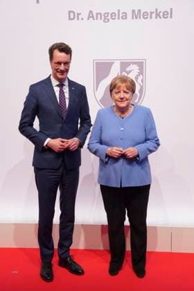 Award NRW State Prize to Angela Merkel Minister President of the State of North Rhine Westphalia Hendrik Wuest together with Chancellor a D Dr Angela Merkel on the Red Carpet for the award of the State Prize 2023 of the State of North Rhine Westphalia to the Chancellor a D in the Flora in Cologne,16 05 2023, Cologne, Cologne North Rhine Westphalia Germany