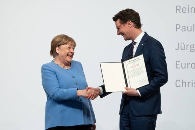 Award of the State Prize 2023 of the State of North Rhine Westphalia to the Chancellor a D Current, 16 05 2023, Cologne, Chancellor a D Dr Angela Merkel laughing with joy with Prime Minister of the State of North Rhine Westphalia Hendrik Wuest on stage at the ceremonial presentation of the State Prize 2023 State of North Rhine Westphalia in the Flo