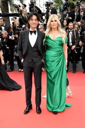 Internationale Filmfestspiele von Cannes, Eröffnung 76th Cannes Film Festival 2023, evening 1 - Opening Red Carpet, Inaugural Ceremony. In the photo Tiziana Rocca and Giulio Base  Copyright: xAlbertoxTerenghix xipa-agency.nex xPoolxPhotoxEventsx01x IPA_IPA37974277