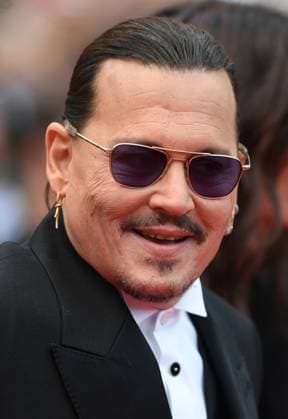 American actor Johnny Depp attends the Opening Gala and premiere of Jeanne du Barry at the 76th Cannes Film Festival at Palais des Festivals in Cannes, France on Tuesday, May 16, 2023.  CAN20230516141 RUNExHELLESTAD