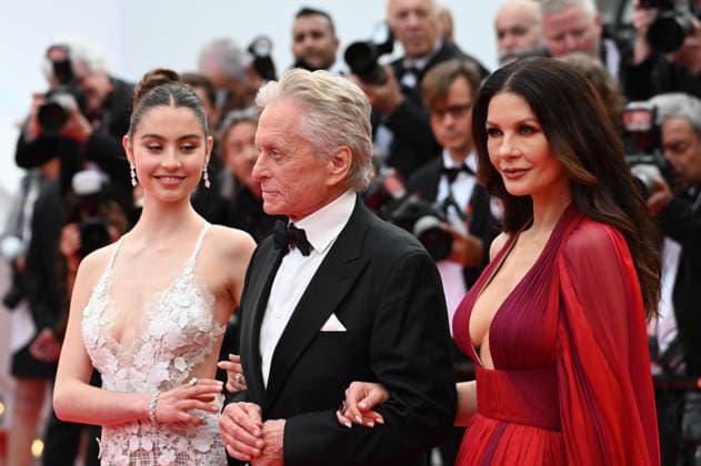 76th Cannes Film Festival 2023, evening 1 - red carpet of the film Jeanne du Barry - opening ceremony. Pictured: Carys Zeta, Michael Douglas and Catherine Zeta-Jones.  Copyright: xManuelexMangiarottix xipa-agencyx xPoolxPhotoxEventsx01x IPA_IPA37983994