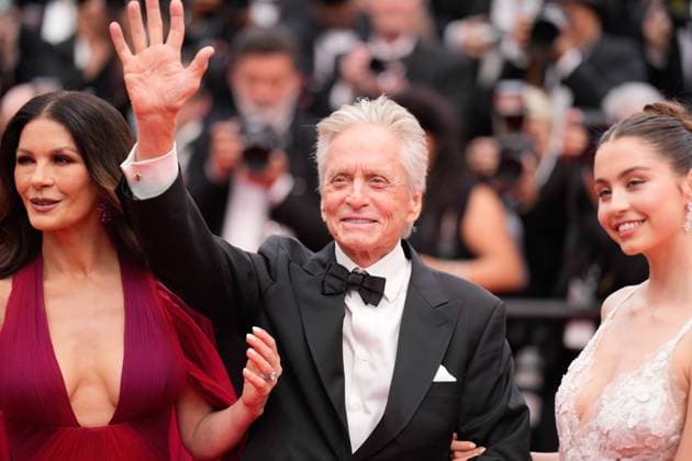 The Jeanne du Barry Film Premiere at the 76th Edition of the Cannes Film Festival Michael Douglas, recipient of the honorary Palme d Or, his wife, Catherine Zeta-Jones, and their daughter, Carys Zeta Douglas, attend the opening gala night and red carpet event of the movie Jeanne du Barry , during the opening ceremony of the 76th edition of the Cannes Film Festival on May 16 2023, in Cannes, France Cannes Palace of Festivals and Congresses of Cannes Cannes France Copyright: xAlexandraxFechetex _ADR7850