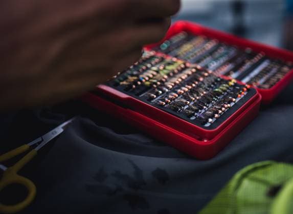 A close-up photo of a box of artificial flies used for fly fishing Colebrook, New Hampshire, United States CR_BRDO230211C-1125371-01