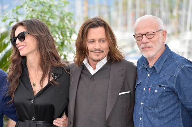 MaÃ¯wenn, Johnny Depp and Pierre Richard at the photocall JEANNE DU BARRY Photocall 76 Cannes Film Festival 17 05 2023