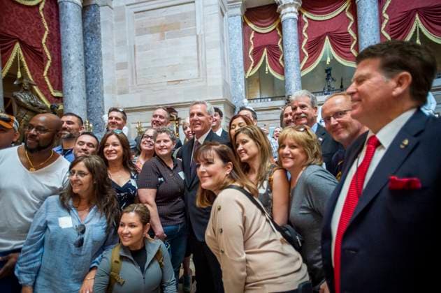 May 17, 2023, Washington, District of Columbia, USA: Speaker of the United States House of Representatives Kevin McCarthy (Republican of California) stops to pose with visitors in Statuary Hall at the US Capitol after departing the House chamber in Washington, DC, Wednesday, May 17, 2023 Washington USA - ZUMAs152 20230517_zaa_s152_081 Copyright: xRodxLamkeyx