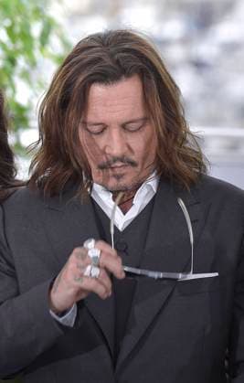 Johnny Depp attends the Jeanne du Barry photocall at the 76th annual Cannes film festival at Palais des Festivals on Wednesday, May 17, 2023 in Cannes, France.  CAN20230517244 RoccoxSpaziani