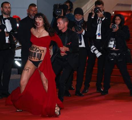 May 17, 2023, Cannes, Cote d Azur, France: An anti-Putin protester disturbs the red carpet arrivals ahead of the screening of Homecoming during the 76th Annual Cannes Film Festival at Palais des Festivals on May 17, 2023 in Cannes, France Cannes France - ZUMAc179 20230517_zep_c179_205 Copyright: xMickaelxChavetx