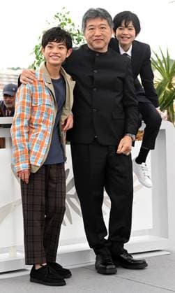 Japanese actors Nagayama Etta, Hiiragi Hinata and director Kore-Eda Hirokazu attend a photo call for Kaibutsu at the 76th Cannes Film Festival at Palais des Festivals in Cannes, France on Thursday, May 18, 2023.  CAN20230518118 RUNExHELLESTAD