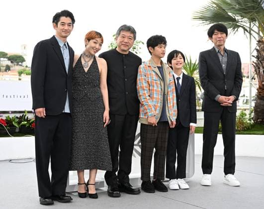 Japanese actress Ando Sakura, actors Nagayama Etta, Hiiragi Hinata, Kurokawa Soya, screenwriter Sakamoto Yuji and director Kore-Eda Hirokazu attend a photo call for Kaibutsu at the 76th Cannes Film Festival at Palais des Festivals in Cannes, France on Thursday, May 18, 2023.  CAN20230518126 RUNExHELLESTAD