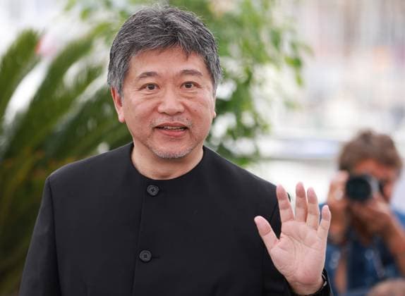 (230518) -- CANNES, May 18, 2023 -- Japanese director Kore-Eda Hirokazu poses during a photocall for the film Kaibutsu (Monster) which will compete for the Palme d Or during the 76th edition of the Cannes Film Festival in Cannes, southern France, May 18, 2023. ) FRANCE-CANNES-FILM FESTIVAL-KAIBUTSU GaoxJing 