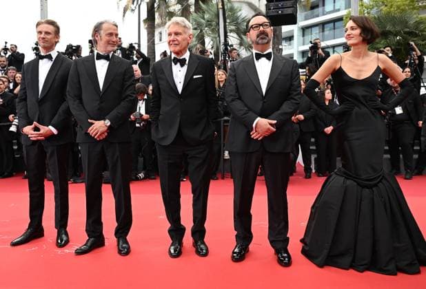 Danish actor Mads Mikkelsen, British actress Phoebe Waller- Bridge, American actors Boyd Holbrook, Harrison Ford and director James Mangold attend the premiere of Indiana Jones And The Dial Of Destiny at the 76th Cannes Film Festival at Palais des Festivals in Cannes, France on Thursday, May 18, 2023.  CAN20230518143 RUNExHELLESTAD