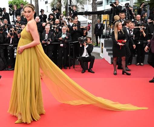 American model Karli Kloss attends the premiere of Indiana Jones And The Dial Of Destiny at the 76th Cannes Film Festival at Palais des Festivals in Cannes, France on Thursday, May 18, 2023.  CAN20230518148 RUNExHELLESTAD