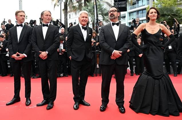 British actress Phoebe Waller- Bridge, American actor Harrison Ford and director James Mangold attend the premiere of Indiana Jones And The Dial Of Destiny at the 76th Cannes Film Festival at Palais des Festivals in Cannes, France on Thursday, May 18, 2023.  CAN20230518137tt RUNExHELLESTAD