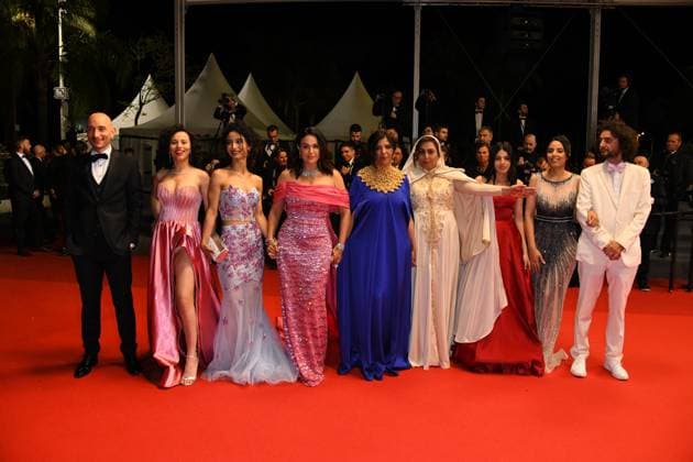 76th Cannes Film Festival 2023, Red Carpet Film Four Daughters. Pictured Nour Karoui, Ichraq Matar, Hend Sabri, Director Kaouther Ben Hania, Olfa Hamrouni, Tayssir Chikhaoui, Tayssir Chikhaoui and Producer Nadim Cheikhrouha  Copyright: xManuelexMangiarottix xipa-agencyx xPoolxPhotoxEventsx01x IPA_IPA38060228