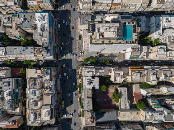 IMAGO Creative, Urban Lifestyle Aerial View Of Athens From A Drone Top down view of the roads with cars, traffic and bulding terraces. Panoramic aerial view from a drone of the urban environment of the Greek capital, Athens. Apartments, buildings and roads in central Athens near Ampelikipi and Zografou residential neighborhood area. Athens, Greece on May 20, 2023 Athens Greece  Copyright: xNicolasxEconomoux originalFilename: economou-aerialvi230519_npzow.jpg